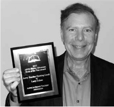 Larry's holding Award plaque from the ABTA Best Bridge Book 2014